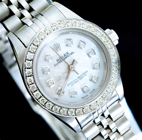 ladies gold rolex with diamond bezel|women's rolex oyster perpetual.